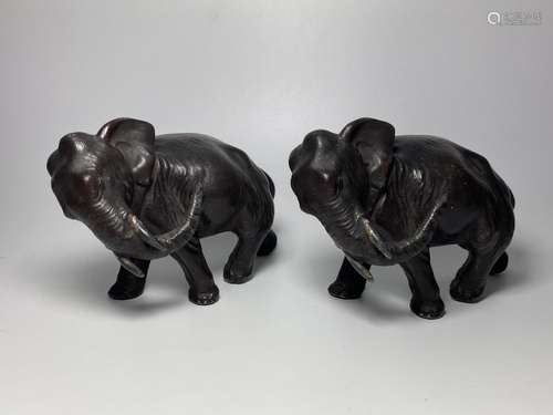 A PAIR OF EARLY 20TH CENTURY JAPANESE METAL MODELS OF ELEPHA...