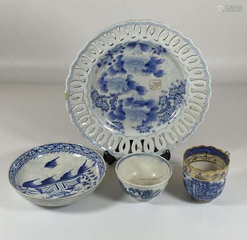 A GROUP OF ANTIQUE BLUE AND WHITE PORCELAIN - JAPANESE PIERC...