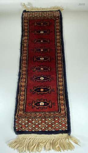 A VINTAGE MIDDLE EASTERN PERSIAN RED SAMPLE RUNNER, LENGTH 6...