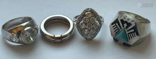 FOUR SILVER DRESS RINGS GROSS WEIGHT 38 GRAMS