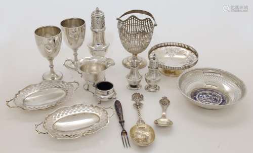 A group of silver, comprising: a swing handle pierced sugar ...