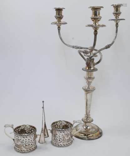 A large silver plated candelabra, with three wrythen branche...