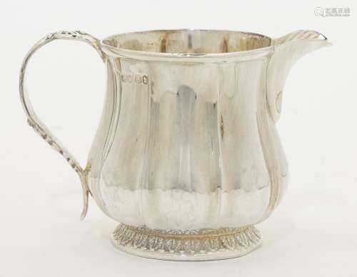 A George IV silver milk jug, London, 1829, makers mark rubbe...