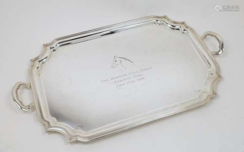 A twin handled silver plate tray, marked TIFFANY & CO. t...