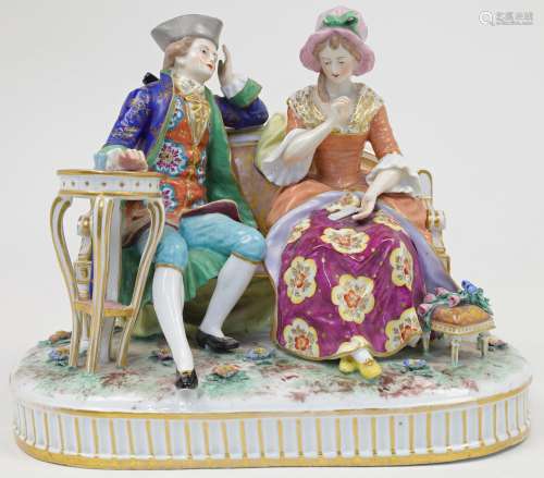 A French porcelain figural group of a gentleman courting a l...