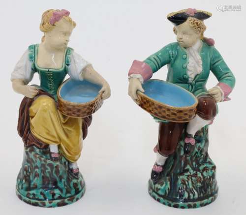 A pair of Minton majolica figures, 1867, impressedMINTONwith...