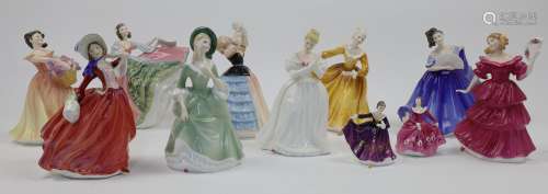A group of Royal Doulton porcelain figures of various ladies...