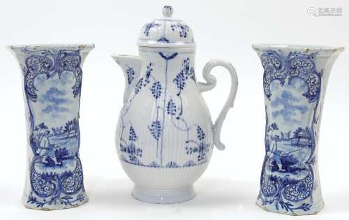 A pair of Dutch Delft blue and white vases, 19th century, of...