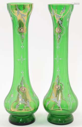 A pair of Bohemian green glass vases, 20th century, of elong...