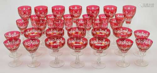 A suite of Victorian ruby flash cut hosting glasses, late 19...