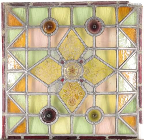 A leaded and stained glass panel, 19th century, of square fo...