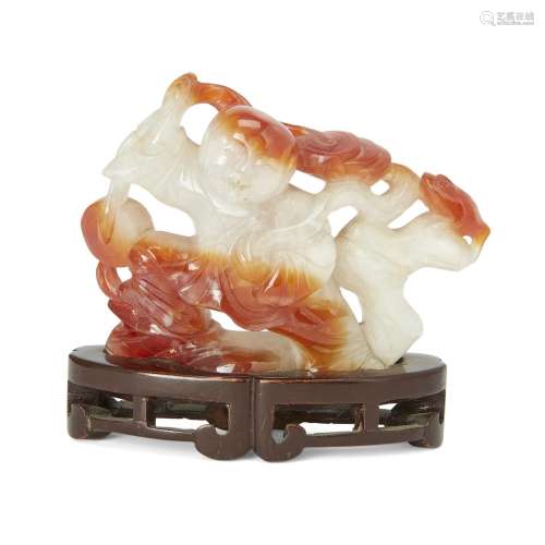 A Chinese carnelian agate carving of Liu Hai, Late Qing dyna...