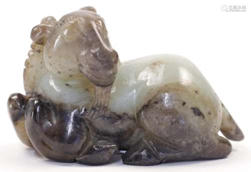 A Chinese jade model of a recumbent ram, 19th / 20th century...