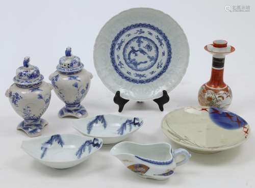A group of eight Japanese porcelain and five Chinese bronzes...