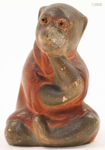 A Japanese stoneware monkey, Meiji period, the moulded anima...