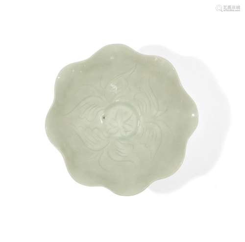 A Chinese carved qingbai-glazed lotus bowl, 20th century, ri...