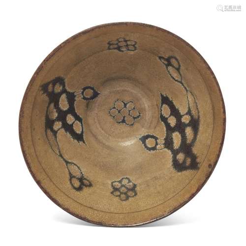 A Chinese Jizhou-type papercut bowl, 20th century, of rounde...