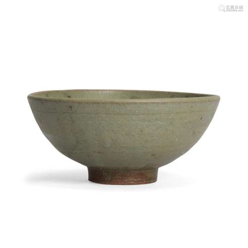 A Chinese celadon-glazed bowl, Ming dynasty, covered in a ce...