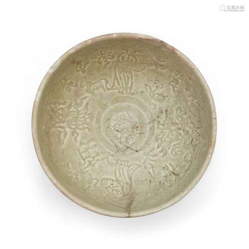 A Chinese Longquan celadon-glazed moulded bowl, Ming dynasty...