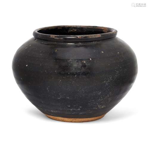 A large Chinese black glazed jar, Ming dynasty, the large gl...