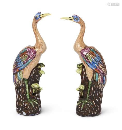 A pair of Chinese porcelain cranes, 20th century, each polyc...