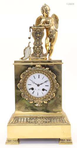 A French Empire style brass mantel clock, 19th century, the ...