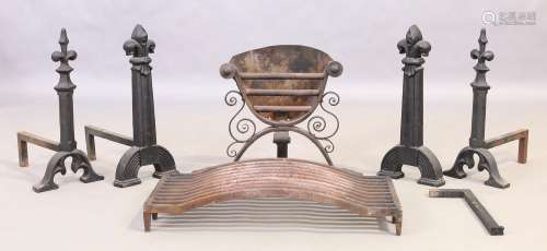 Two pairs of cast iron andirons and two fire grates, 20th ce...