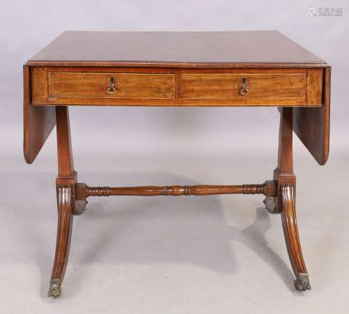 A George III mahogany sofa table, first quarter 19th century...