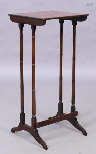 One table from a nest of four English mahogany quartetto tab...