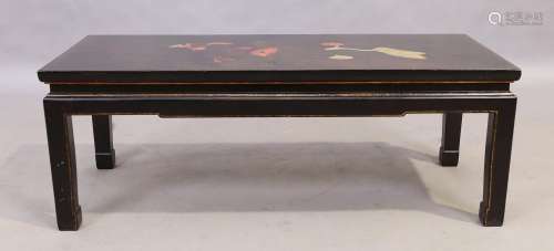 A Chinese black lacquered low table, 20th century, painted w...