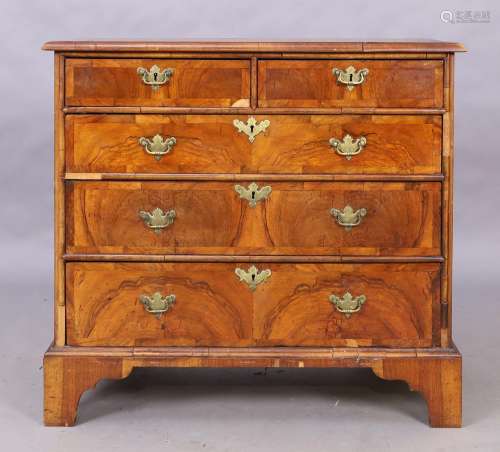 An English walnut chest, 18th century and later, two short a...