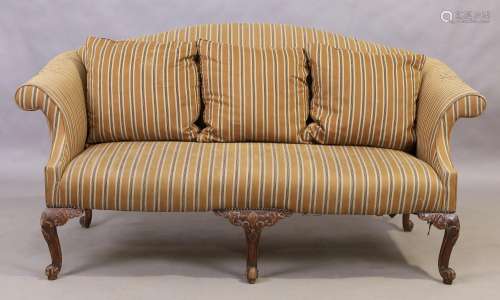 An English mahogany framed camel back sofa, George II style,...