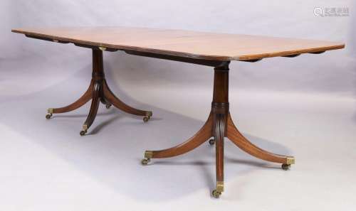 An English mahogany dining table, George III style, 20th cen...