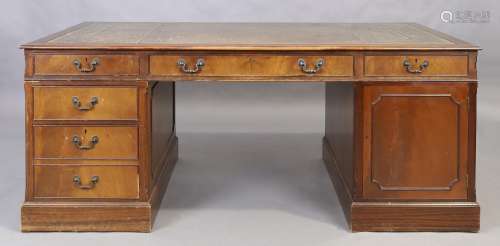 An English mahogany partners desk, George III style, 20th ce...