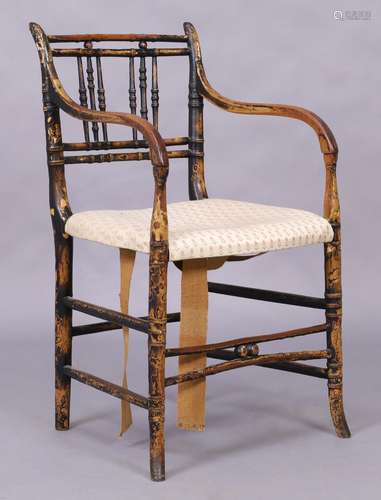 A Regency lacquered faux bamboo armchair, first quarter 19th...