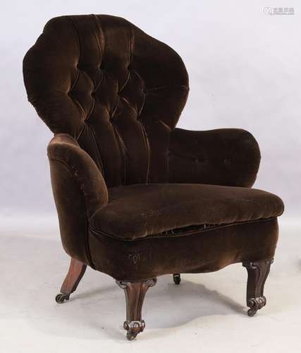 A Victorian mahogany spoon back armchair, third quarter 19th...