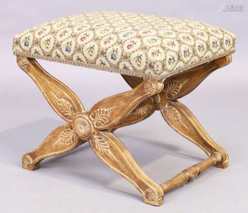 A French stained beechwood X-frame stool, 20th century, with...