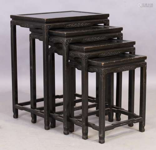 A nest of four Chinese hardwood tables, 20th century, 66cm h...