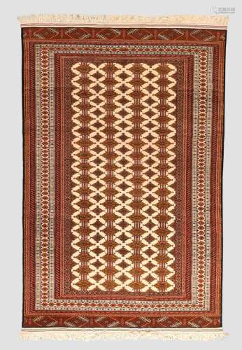 An Afghan Turkmen carpet, the central field with repeating g...
