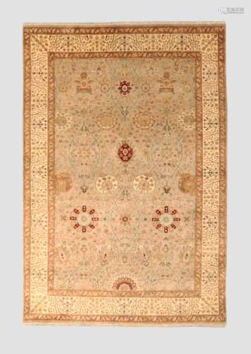 An Indian Kashmir rug, the central field with floral motifs ...