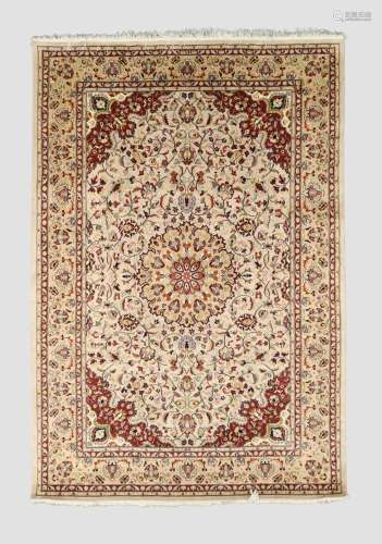 An Indian Kashmir carpet, the central field with floral meda...