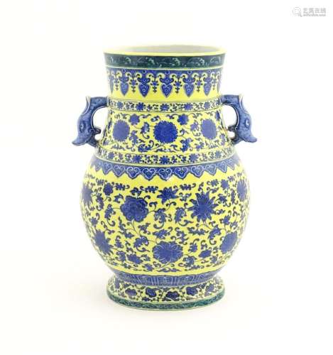 A Chinese famille jeune vase with twin handles of …