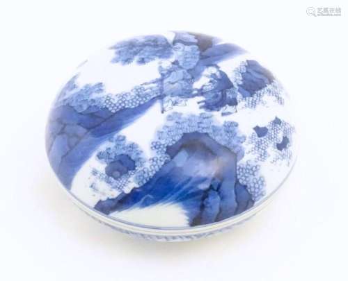 A Chinese blue and white ink pot and cover of circ…