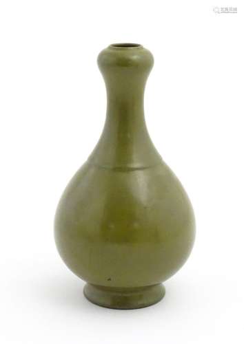 A Chinese bottle vase with tea coloured glaze. Cha…