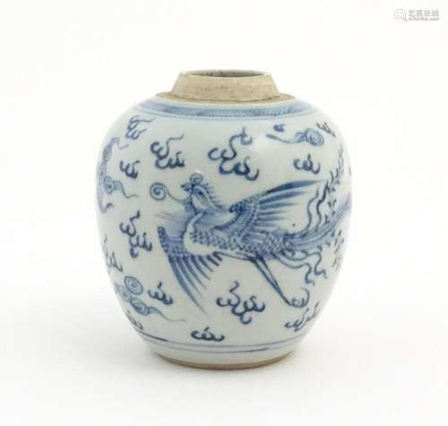 A small Chinese blue and white jar decorated with …
