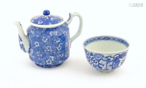 A Chinese blue and white teapot decorated with pru…