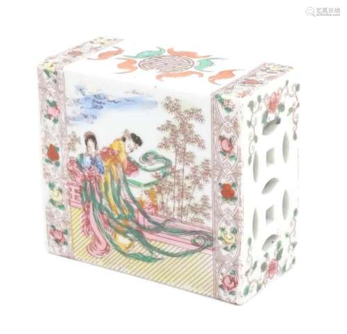 A Chinese pillow / flower brick decorated with fem…