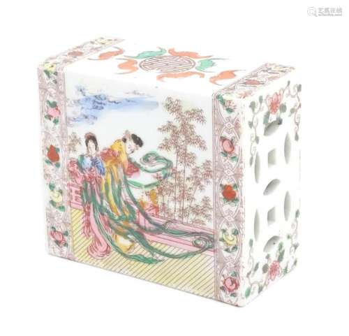 A Chinese pillow / flower brick decorated with fem…