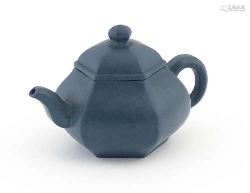 A Chinese Yixing teapot of hexagonal form with a b…