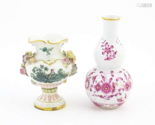 Two small Continental vases comprising a double go…